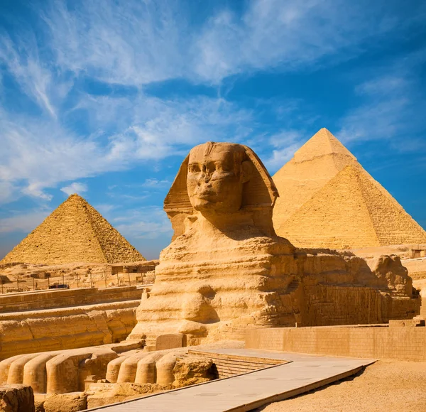 depositphotos_129296148-stock-photo-sphinx-full-body-blue-sky
